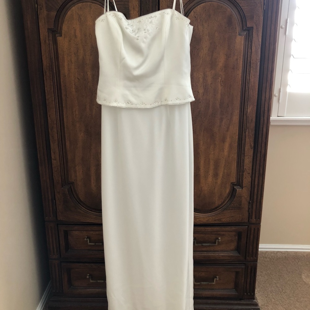 Wedding dress or mother of the bride dress.